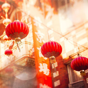 Red Lanterns hanging over a street in Chinatown San Francisco by Tracey Capone